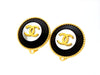 Vintage Chanel earrings CC logo black wood round