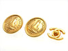 Vintage Chanel earrings CC logo COW round