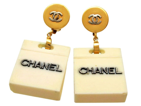 Vintage Chanel earrings CC logo white bag dangle