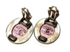 Vintage Chanel earrings CC logo round purple stone