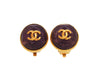 Vintage Chanel earrings CC logo purple stone round