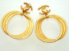 Authentic vintage Chanel earrings gold CC logo dangled plural hoops