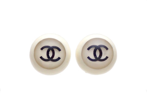 Authentic vintage Chanel earrings plastic white round black double C
