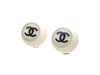 Authentic vintage Chanel earrings plastic white round black double C