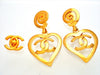 Authentic vintage Chanel earrings Whorl Clip Heart CC logo Dangled