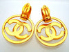 Authentic vintage Chanel earrings CC logo round dangled