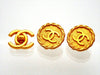 Authentic vintage Chanel earrings Gold CC logo Round