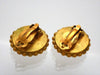 Authentic vintage Chanel earrings black and gold round CC logo