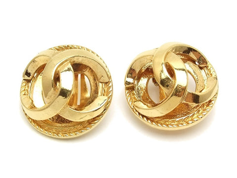 Authentic vintage Chanel earrings gold CC round