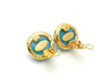 Authentic vintage Chanel earrings gold CC light blue glass stone