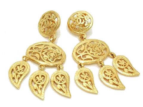 Authentic vintage Chanel earrings gold CC swing flower drop dangle