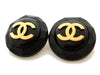 Authentic vintage Chanel earrings gold CC black plastic round clip on