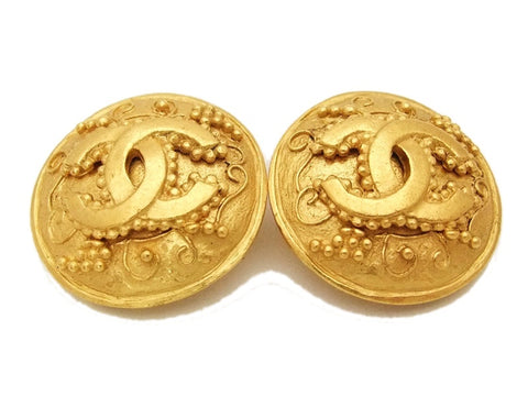 Authentic vintage Chanel earrings gold CC round clip on