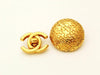 Authentic vintage Chanel earrings gold logo round clip on