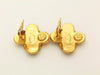 Authentic vintage Chanel earrings gold CC cross clip on