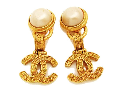 Authentic vintage Chanel earrings pearl swing gold CC dangle clip on