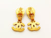 Authentic vintage Chanel earrings pearl swing gold CC dangle clip on