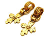 Authentic vintage Chanel earrings swing gold CC cross dangle huge