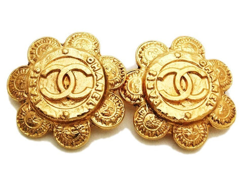 Authentic vintage Chanel earrings gold cc logo sun round clip on