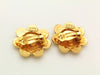 Authentic vintage Chanel earrings gold cc logo sun round clip on
