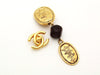 Authentic vintage Chanel earrings gold CC medal red glass stone dangle