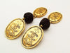 Authentic vintage Chanel earrings gold CC medal red glass stone dangle