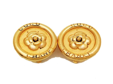 Authentic vintage Chanel earrings gold logo camellia button round