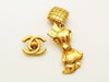 Authentic vintage Chanel earrings gold rhombus swing ribbon dangle