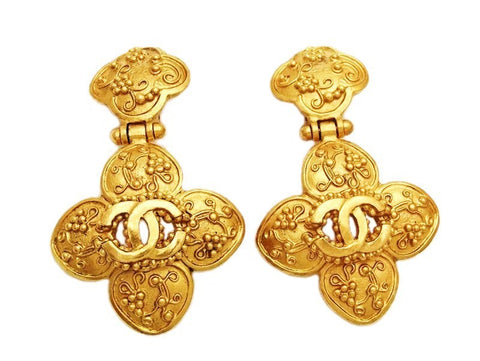 Authentic vintage Chanel earrings swing gold CC flower dangle real