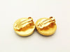 Authentic vintage Chanel earrings gold CC red glass stone round clip