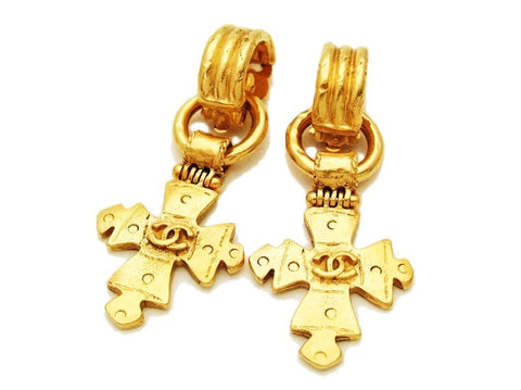 Authentic vintage Chanel earrings swing gold cc logo cross dangle