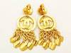 Authentic vintage Chanel earrings gold CC logo swing charm dangle