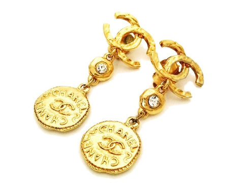 Authentic vintage Chanel earrings gold CC logo rhinestone medal dangle