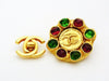 Authentic vintage Chanel earrings gold CC logo red green stone round