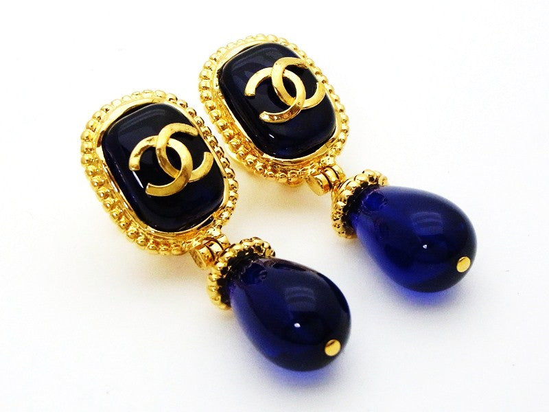 Authentic vintage Chanel earrings gold CC navy blue stone drop dangle