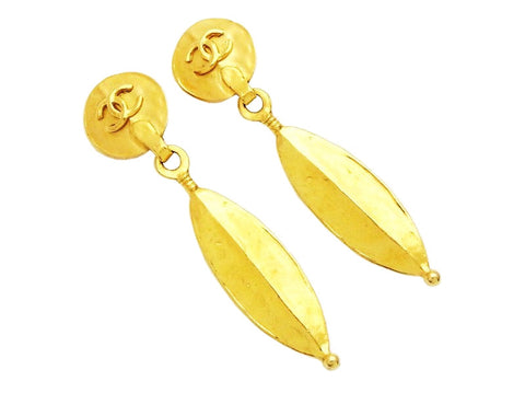 Authentic vintage Chanel earrings gold CC logo swing charm dangle long