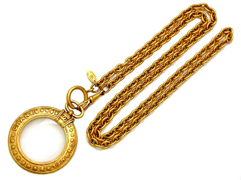 Vintage Chanel loupe necklace CC logo star