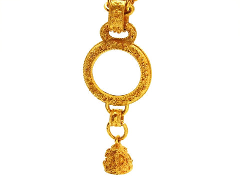Vintage Chanel necklace loupe CC logo bell dangle