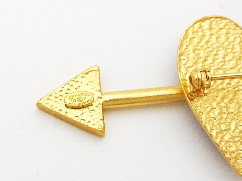 Authentic vintage Chanel pin brooch gold CC black heart arrow