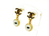 Vintage Chanel stud earrings CC logo rhinestone white button dangle