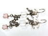 Vintage Chanel stud earrings CC logo rhinestone dangle long