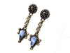 Vintage Chanel stud earrings CC logo light blue stone