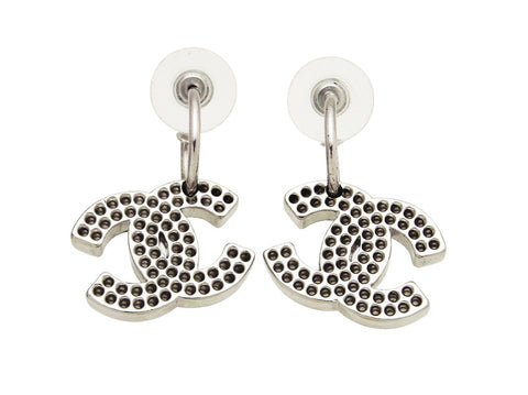 Vintage Chanel stud earrings punched CC logo dangle