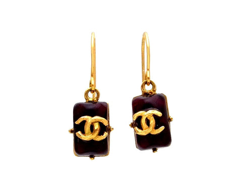 Vintage Chanel stud earrings CC logo red glass stone