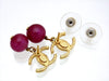 Vintage Chanel stud earrings CC logo glass stone dangle