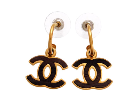 Vintage Chanel stud earrings wood CC logo dangle